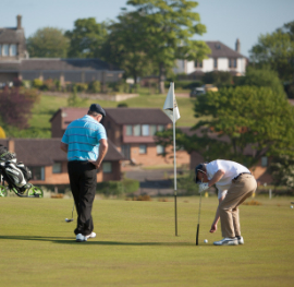 Playing golf